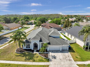 Building Photo - Luxurious Pool Home with 3-Car Garage in G...