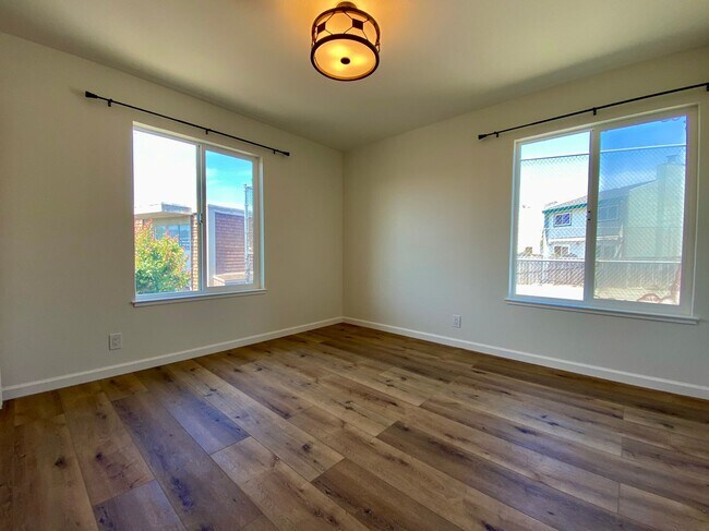 Building Photo - Remodeled 3BR, 2BA with Orchard, Garage & ...