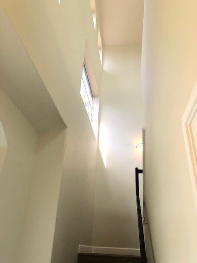 Building Photo - PICTURE PERFECT 2 BR/2 BATH PLUS LOFT END UNIT CONDO WITH DIRECT ACCESS 2 CAR GARAGE