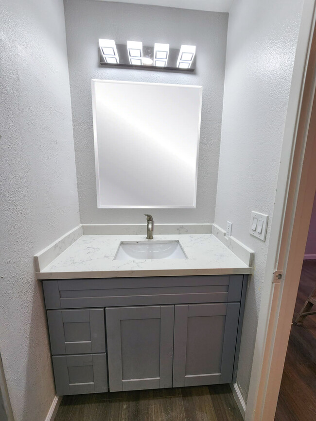 Recently remodeled bathroom inside out - 2040 Main St