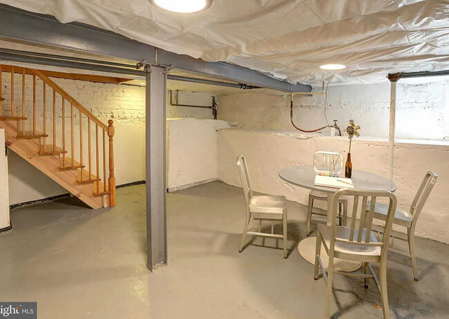 Basement (lots of storage, play area) - 1328 K St SE