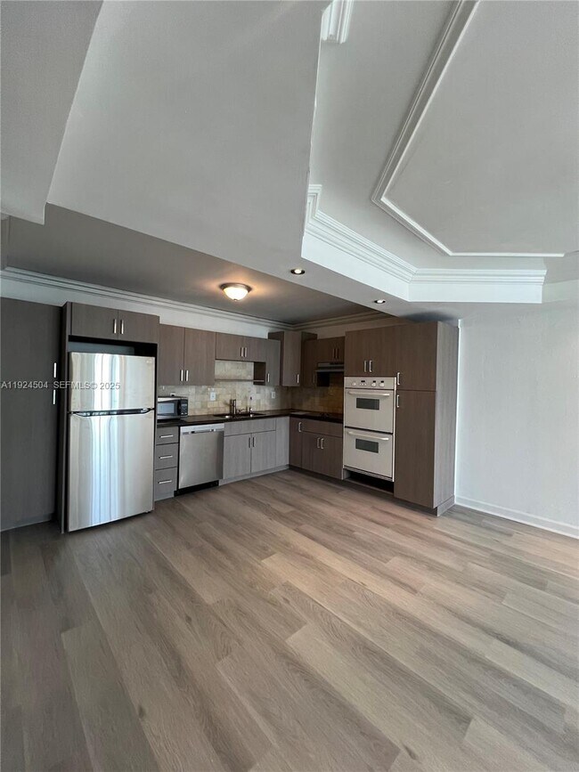 Building Photo - 19380 Collins Ave