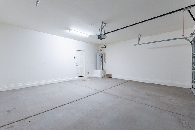Building Photo - Three Bedrooms! Newer Neighborhood - conve...