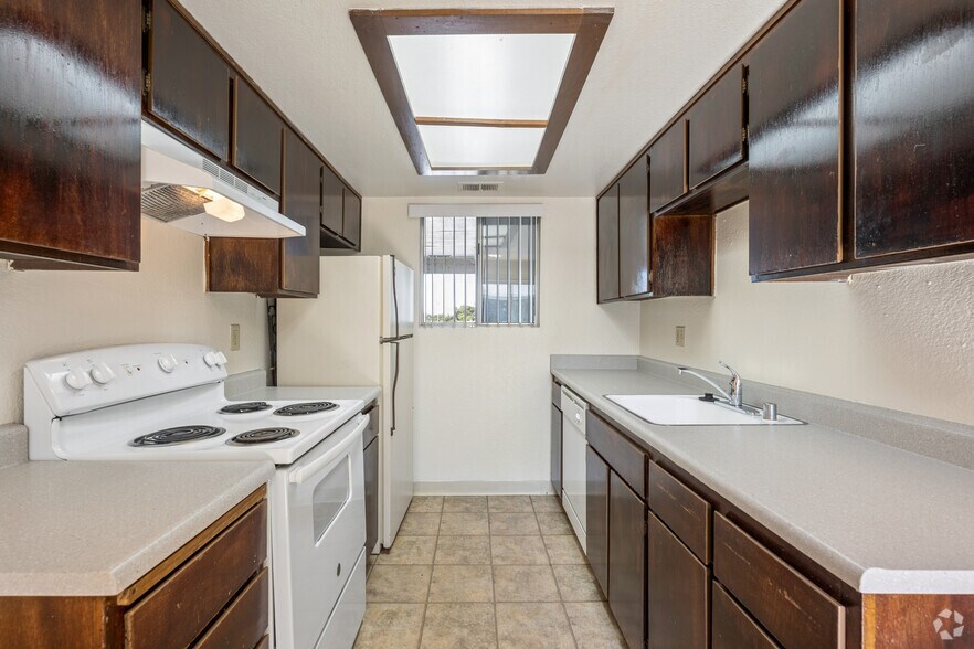 Plan 2 - 2BR, 1BA - 871SF - Kitchen - Riverbank Condominiums