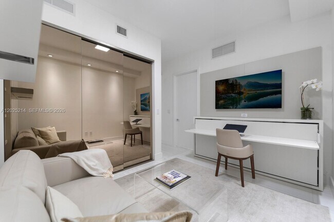 Building Photo - 10203 Collins Ave