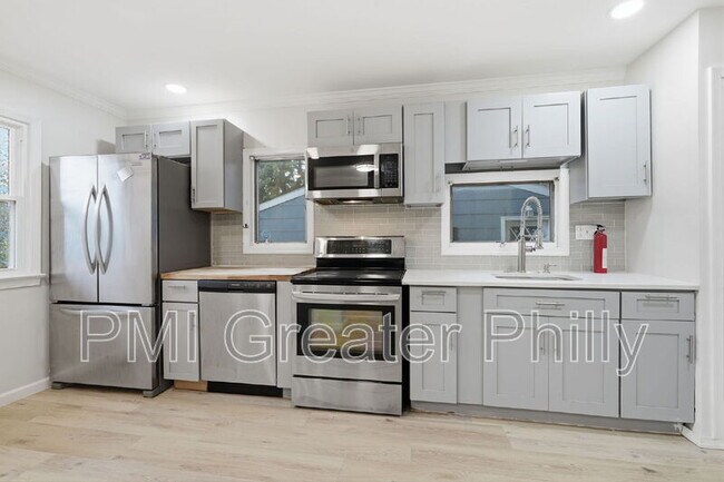 Building Photo - 1523 W Cheltenham Ave