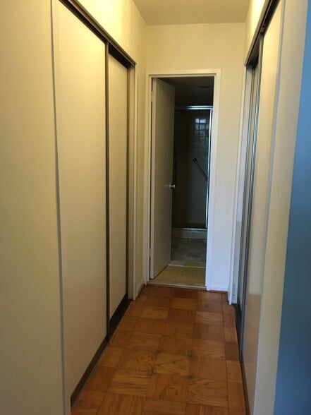 Master bedroom with two rows of closets and new custom made sliding doors - 5101 River Rd