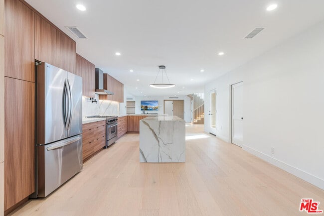 Building Photo - 5110 Garden Grove Ave