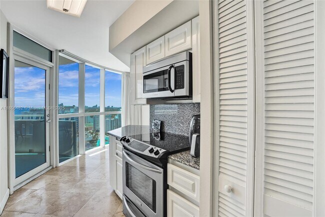 Building Photo - 6301 Collins Ave