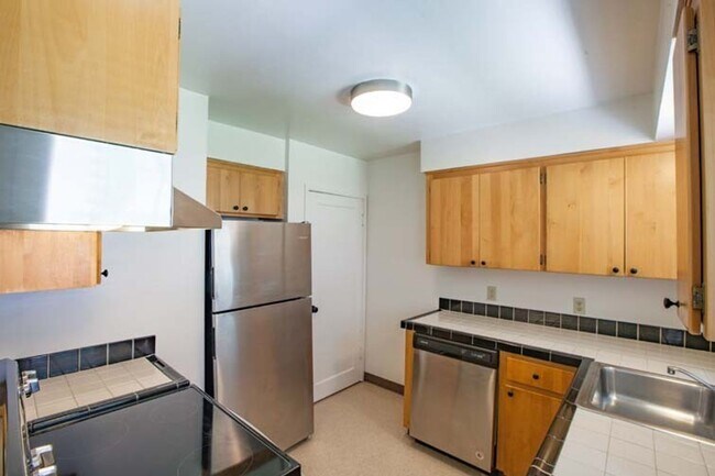 Building Photo - Tranquil Mid-Century Retreat in a Lush Set...