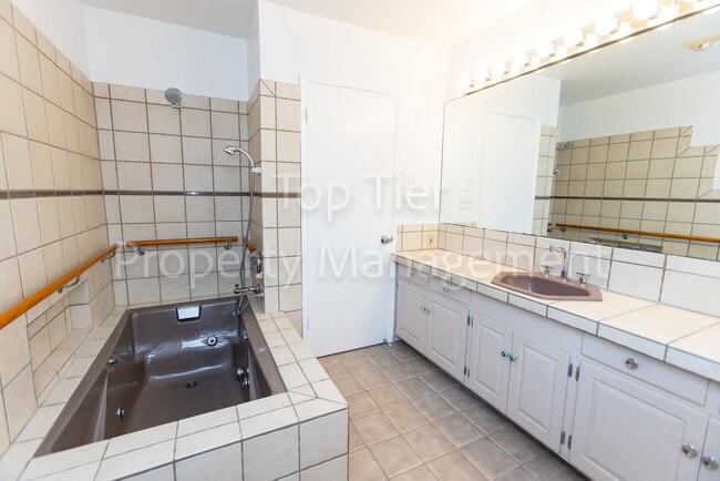 Building Photo - Charming Mid-Century Home | 4BR, 3BA | 2,4...