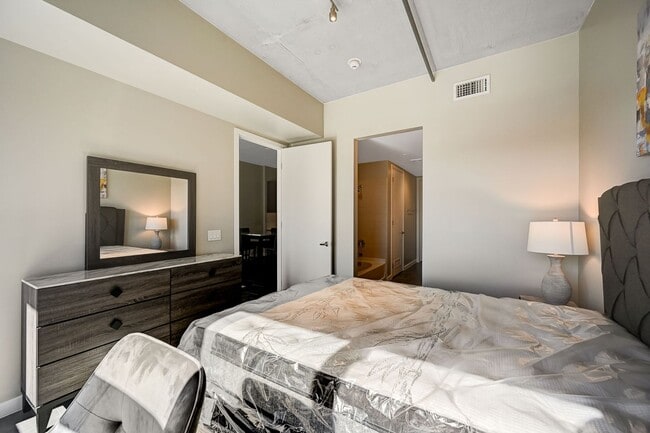 Building Photo - Fully Furnished 4th-Floor Condo with Stunning Downtown Views!