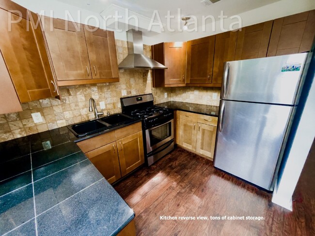 Building Photo - Pet Friendly End Unit!