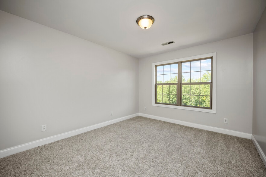 Second Floor - 3 of 3 (12x10) Bedrooms overlooking beautiful Greenspaces, Tree line and back yard. - 393 Hays Blvd