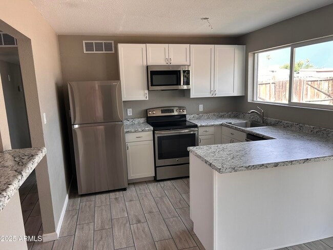 Building Photo - 4736 E Burgess Ln