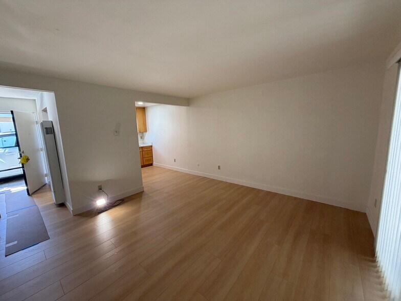 large living room with patio doors and window for plenty of light - 136 Pryce St