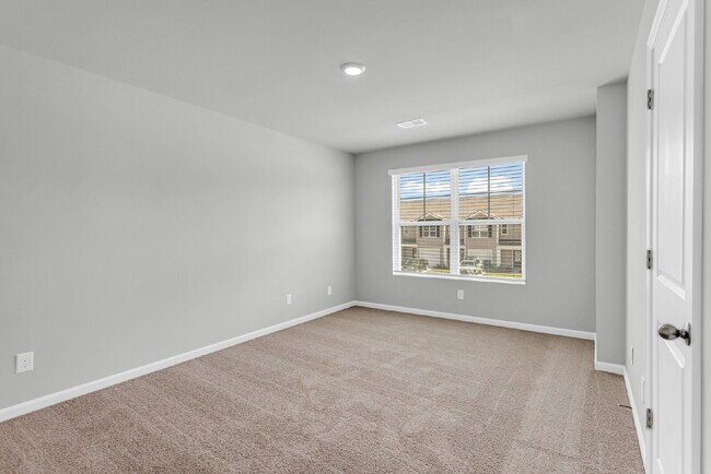 Building Photo - Beautiful Townhome at the Pines of New Hampstead