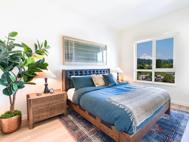 Featuring sleek quartz countertops and elegant front-lit mirrors, these spaces offer a perfect blend of style and function. - Modera Beaverton