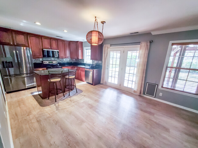 Kitchen dining w/ Island - 403 Arbor Oaks Dr