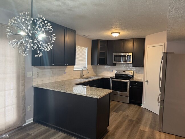 Building Photo - 5643 Imperial Woods Cir