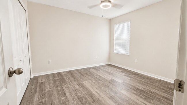 Building Photo - Beautiful Corner-Unit Townhome in a Gated Community!