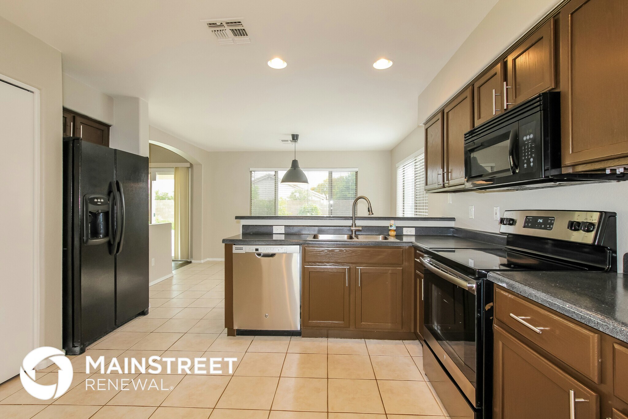 Building Photo - 7013 W Aire Libre Ave