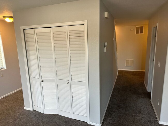 Building Photo - CHARMING 3BD TOWNHOME IN GATED COMMUNITY JUST MINUTES FROM PETERSON AFB & FORT CARSON - Security ...