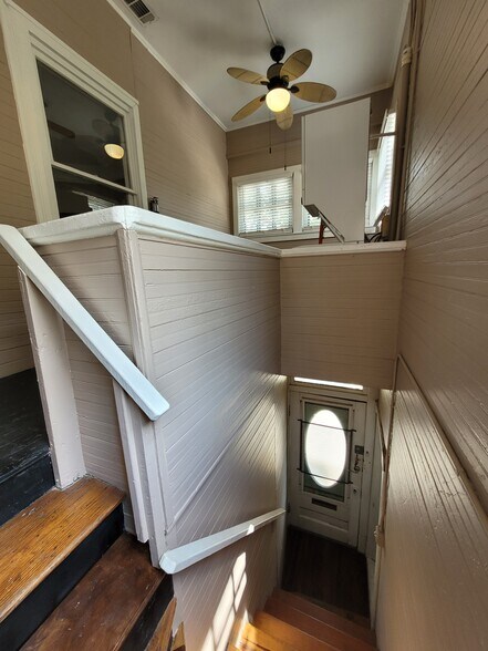 From the stair landing - front door downstairs & large laundry/utility loft w stacked washer/dryer u - 1217 Java Pl