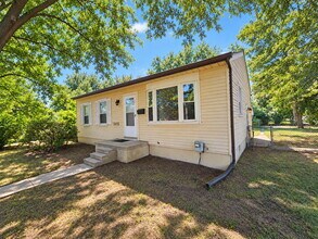 Building Photo - 3-Bedroom, 2-Bathroom Ranch with Hardwood Flooring, Tiled Kitchen and Finished Basement with a 2 ...