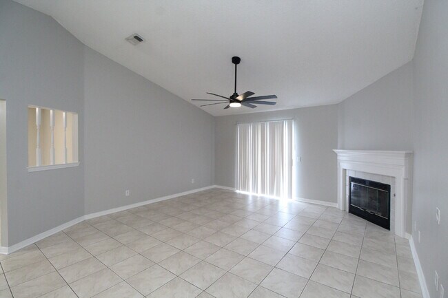 Building Photo - West Pensacola Brick Home with Vaulted Ceilings, Split Floor Plan, Open Living Design & Easy Acce...