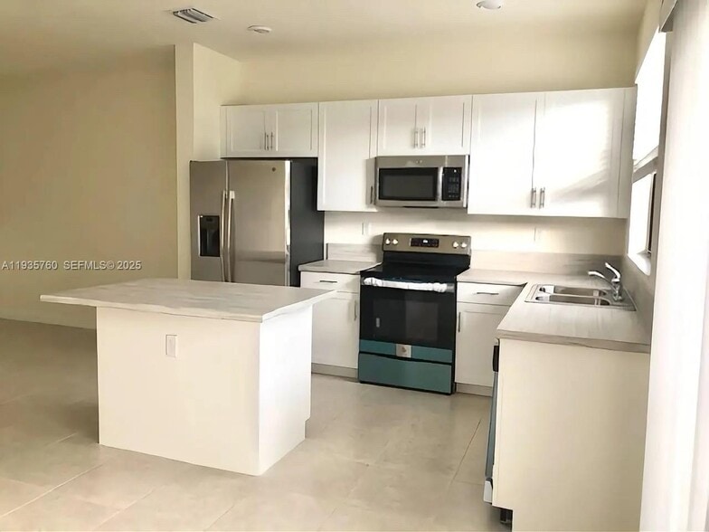 Building Photo - 3276 W 106th Ter