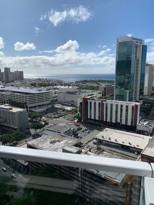 Building Photo - Moana Pacific - 2 bedroom plus den, 2 bath Condo with 2 parking - avail now!