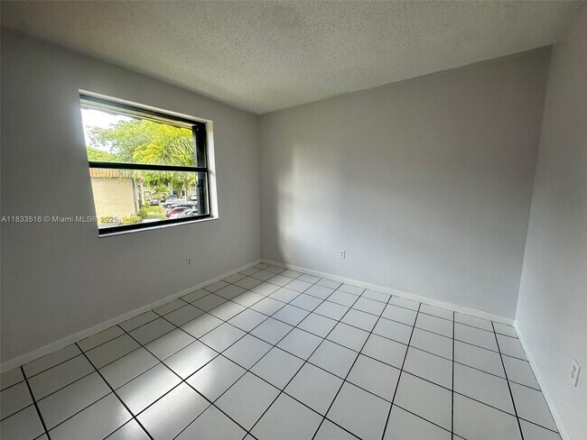 Building Photo - 9808 Hammocks Blvd