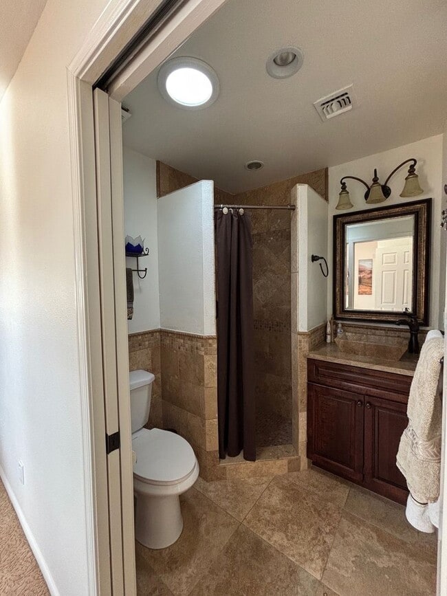 Building Photo - Welcome to this stunning updated 2-bedroom, 2-bathroom home on a lake located in the vibrant comm...