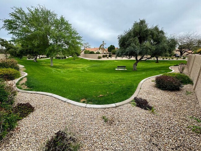 Building Photo - Welcome to this stunning 4 bedroom, 2 bath...