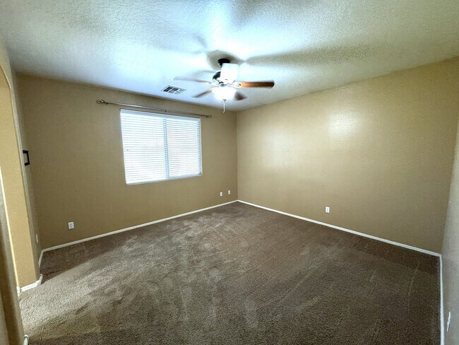 Building Photo - Beautiful 4-bedroom, 2-bath single-story home with Fully Landscaped Backyard