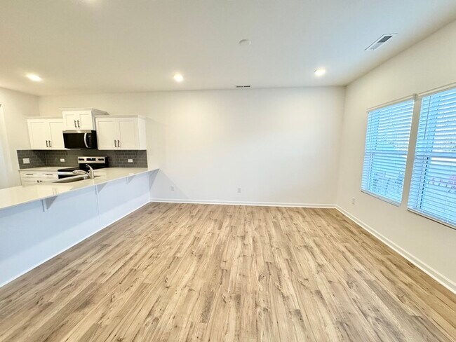 Building Photo - Three bedroom 2 1/2 bath single-family home in the new Kensington community