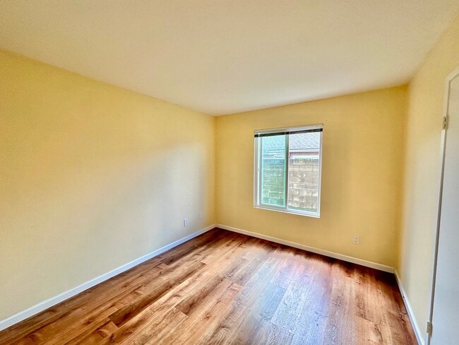 Building Photo - Remodeled 4 bedroom with central A/C and 2 car garage!