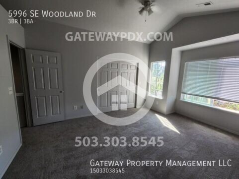 Building Photo - 5996 SE Woodland Dr