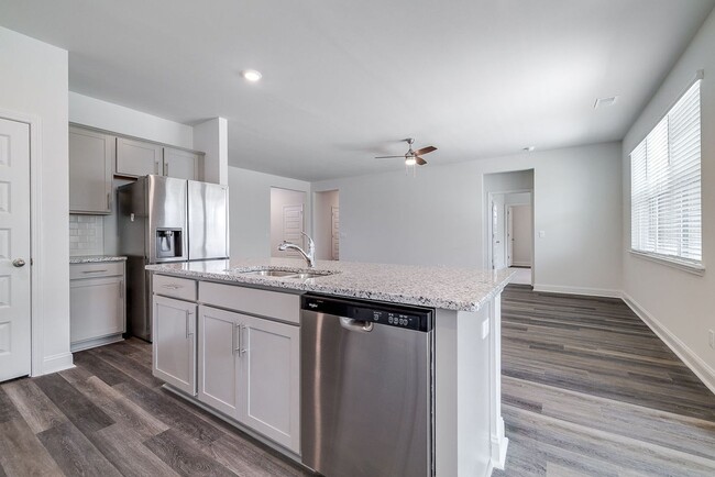 Building Photo - Beautiful 4BR Home in Woodland Trail – Top...