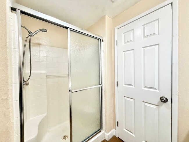 Building Photo - Spacious 5 Bedroom Home with 3 Car Garage & Primary Suite Balcony