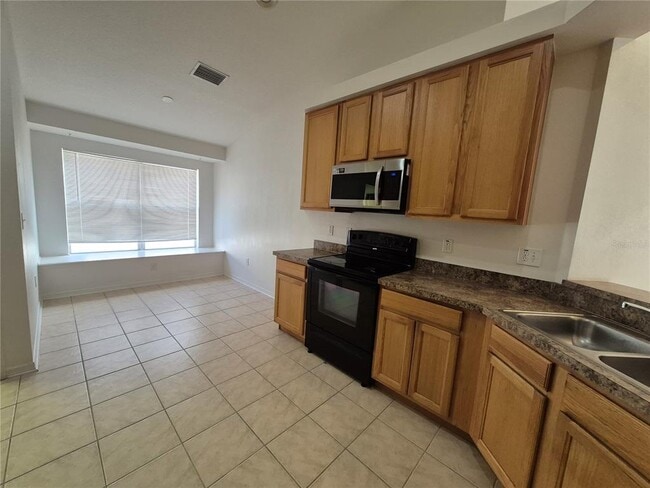 Building Photo - 6833 Runner Oak Dr