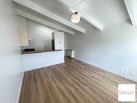Building Photo - GOOD SIZED STUDIO - NEW LAMINATE HARDWOOD FLRS, NEW KITCHEN + BATH FEATURES!