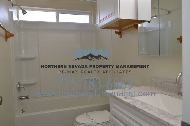 Building Photo - 4 Bed ~ 2 Bath ~ Large Home on Corner lot off of S McCarren in Donner Springs Neighborhood~ FOR RENT
