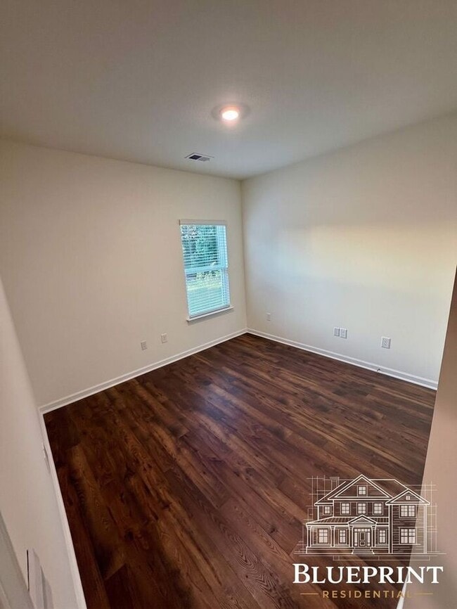 Building Photo - Single story living 2025 build with custom layout and many upgrades! Private backyard! Available ...