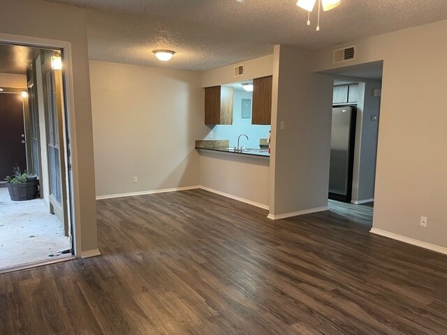 one bedroom with wood flooring - Ashley Oaks
