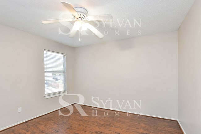 Building Photo - The living is easy in this gorgeous 4BR, 2.5BA brick home