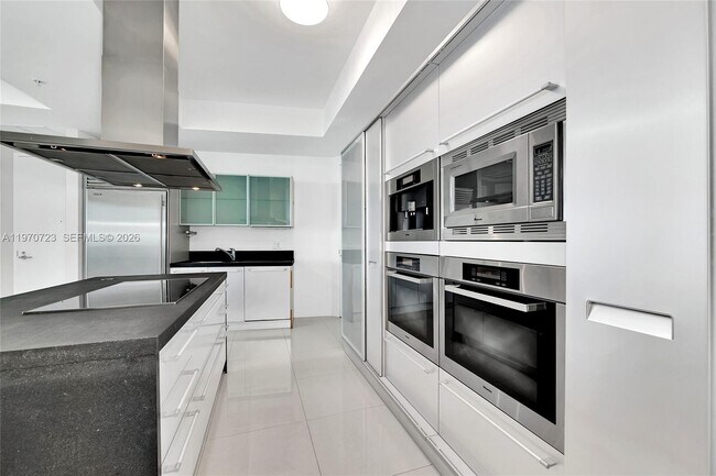 Building Photo - 18201 Collins Ave