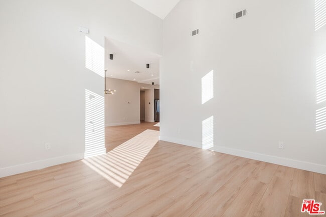 Building Photo - 8670 Encino Ave