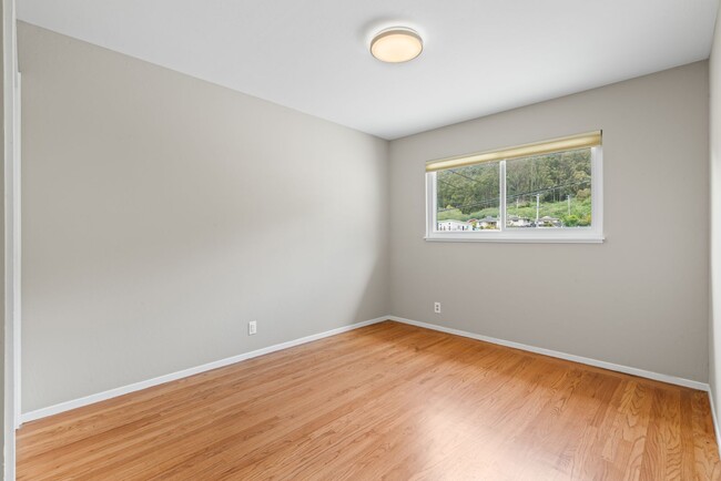 Building Photo - Coastal Charm in Linda Mar - Spacious Home...